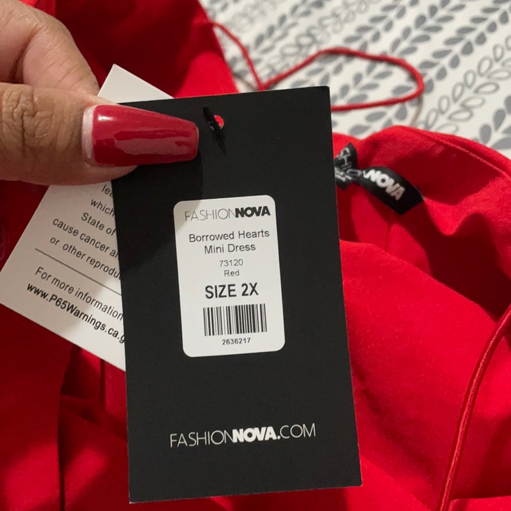 Red fashion nova dress with side slit and dangling jewels